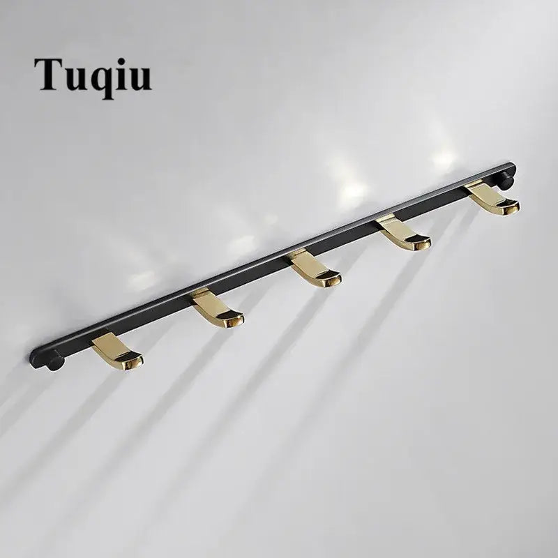 Black gold metal wall mounted robe rack with five hooks for towel storage by decorbites brass
