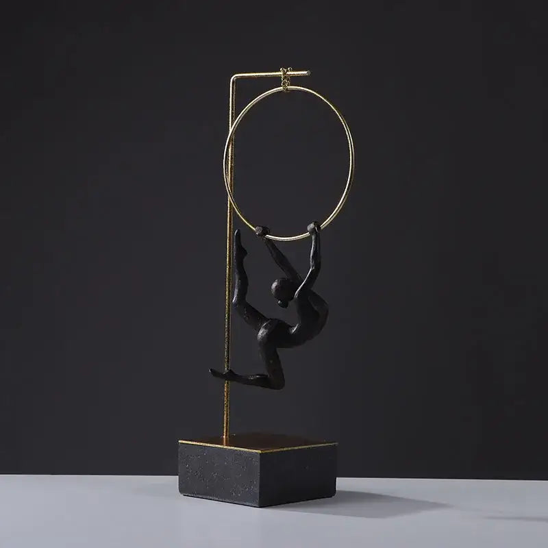 Black and gold gymnastic acrobat resin sculpture on adjustable metal pole with matte black base for decorbites gymnastic acrobat decor
