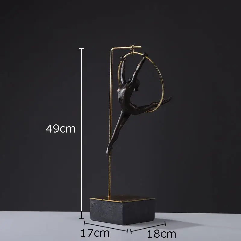 Bronze gymnastic acrobat resin sculpture suspended in golden hoop on elegant gold stand for living room decorbites decor