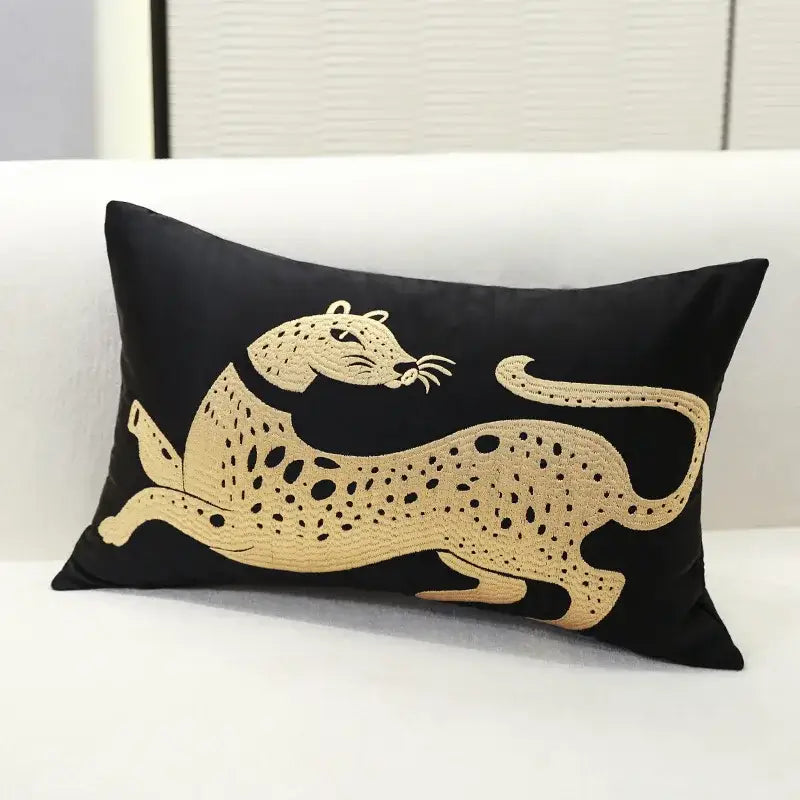 Black velvet embroidery pillow cover featuring a golden leaping leopard for stylish living room decor