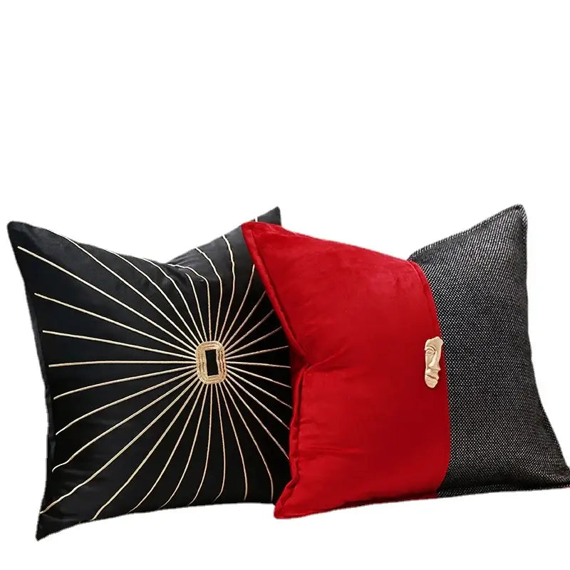 Black and red decorative pillow covers with gold sunburst embroidery and metallic face accent for living room decor