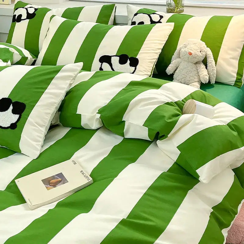 Green and white striped bedding set with embroidered panda faces contrasting black and gray cat embroidery stripes design