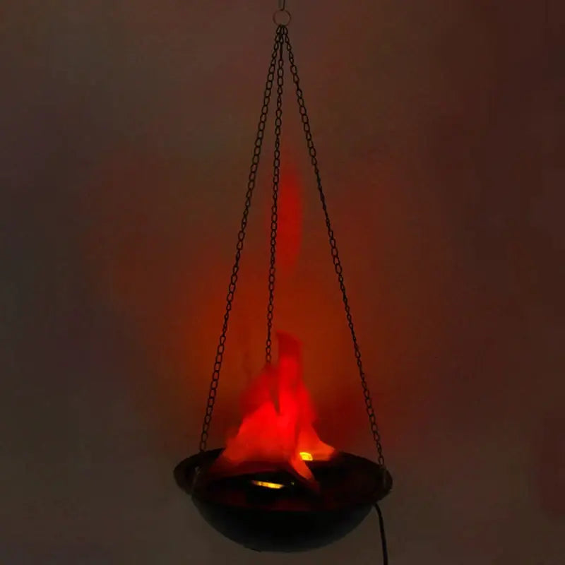 Black hanging electronic brazier flame lamp with glowing red led flames used as a pendant light for bars