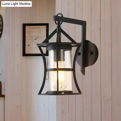 مصباح حائط صناعي أسود مع أسطوانة زجاجية شفافة ولوحة خلفية مستطيلة/دائرية