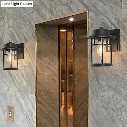 مصباح حائط صناعي أسود مع أسطوانة زجاجية شفافة ولوحة خلفية مستطيلة/دائرية