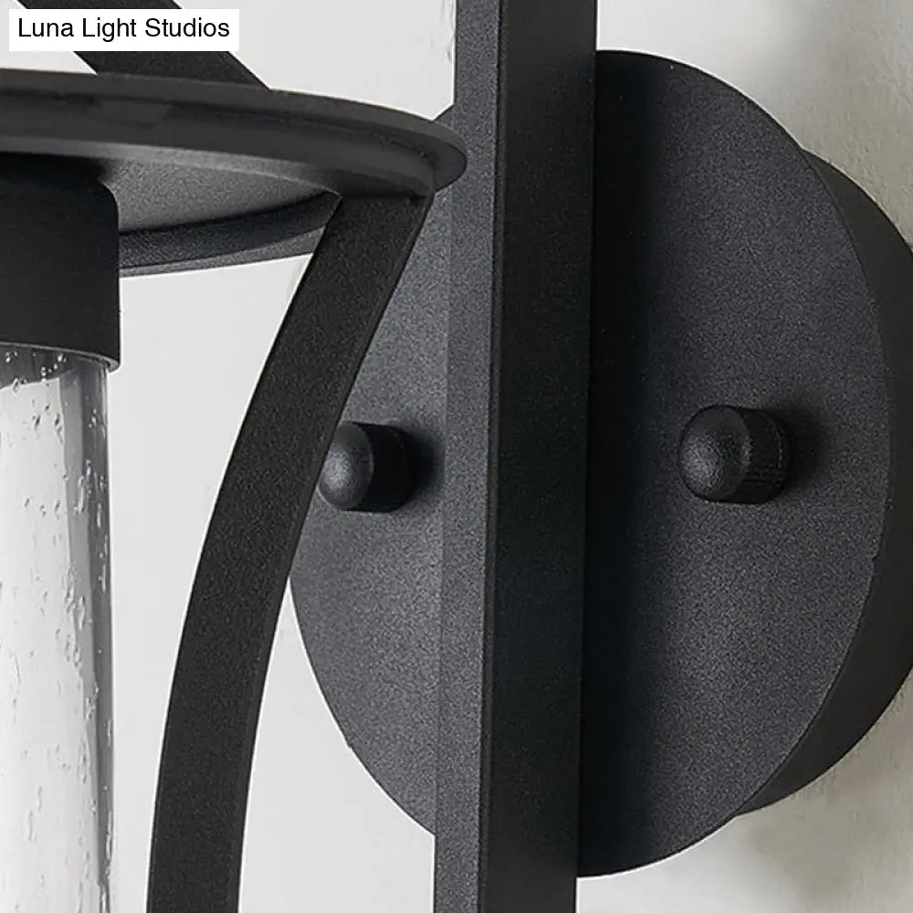 مصباح حائط صناعي أسود مع أسطوانة زجاجية شفافة ولوحة خلفية مستطيلة/دائرية