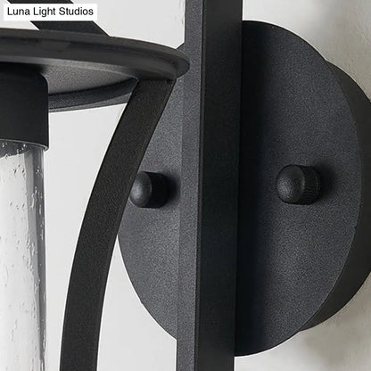 مصباح حائط صناعي أسود مع أسطوانة زجاجية شفافة ولوحة خلفية مستطيلة/دائرية