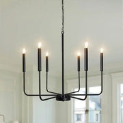 Black iron branch chandelier pendant light with six candle-style bulbs for dining room decorbites iron branch design