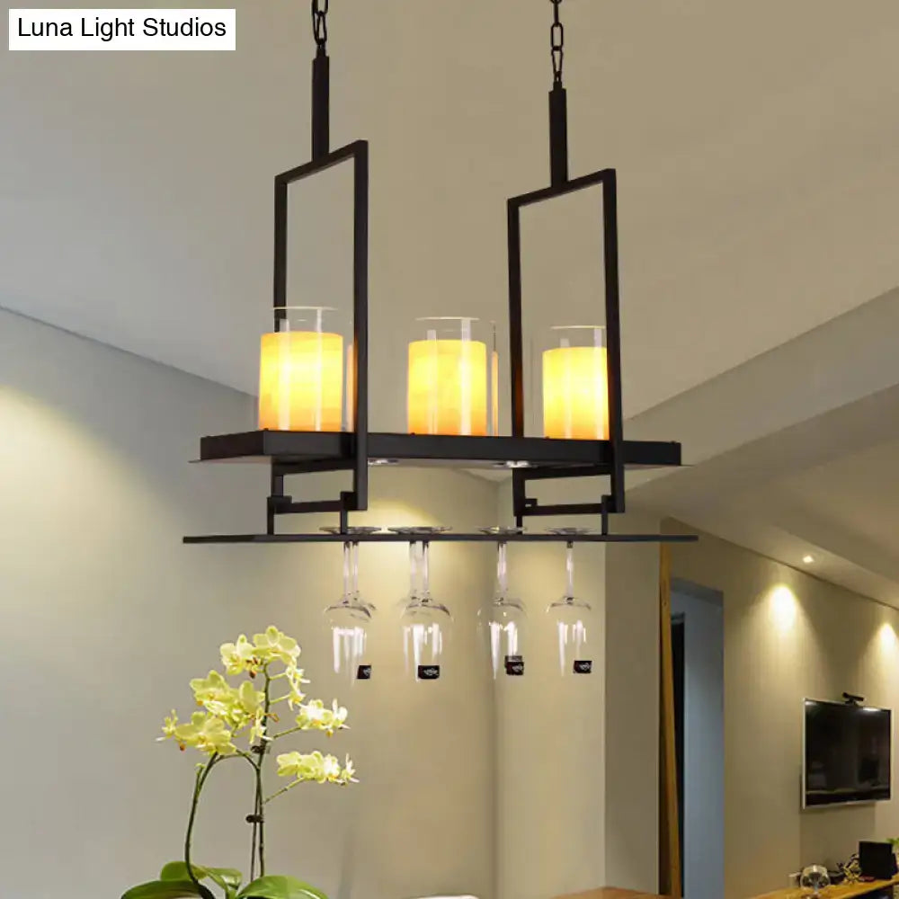 DecorBites black metal island light fixture with three amber candle-style lights and integrated clear glass cylindrical holders