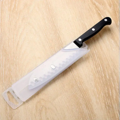 Black knife scabbard set with decorbites knife serrated blade black handle encased in clear plastic sheath