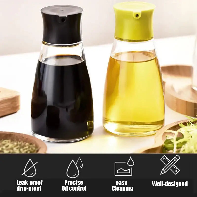 Two glass 170ml seasoning bottles with black and lime green caps filled with soy sauce and olive oil