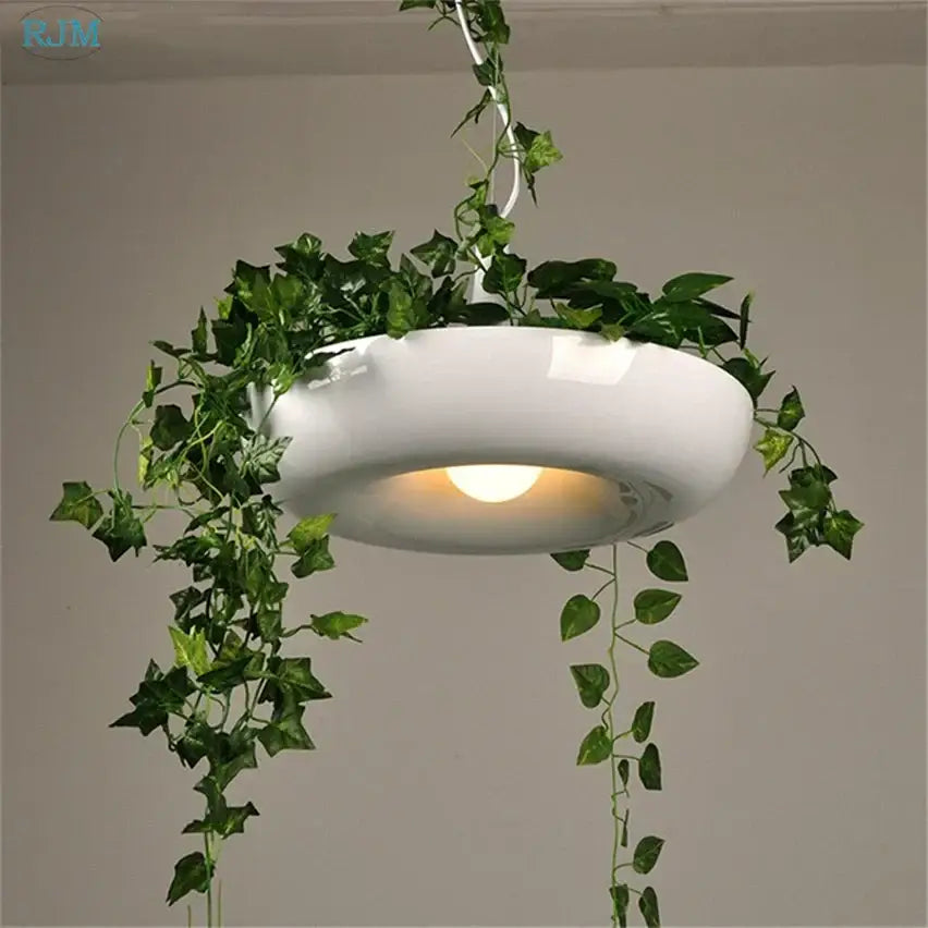 White ceramic pendant light with integrated green ivy vines in black matte babylon garden pot plants kitchen decor
