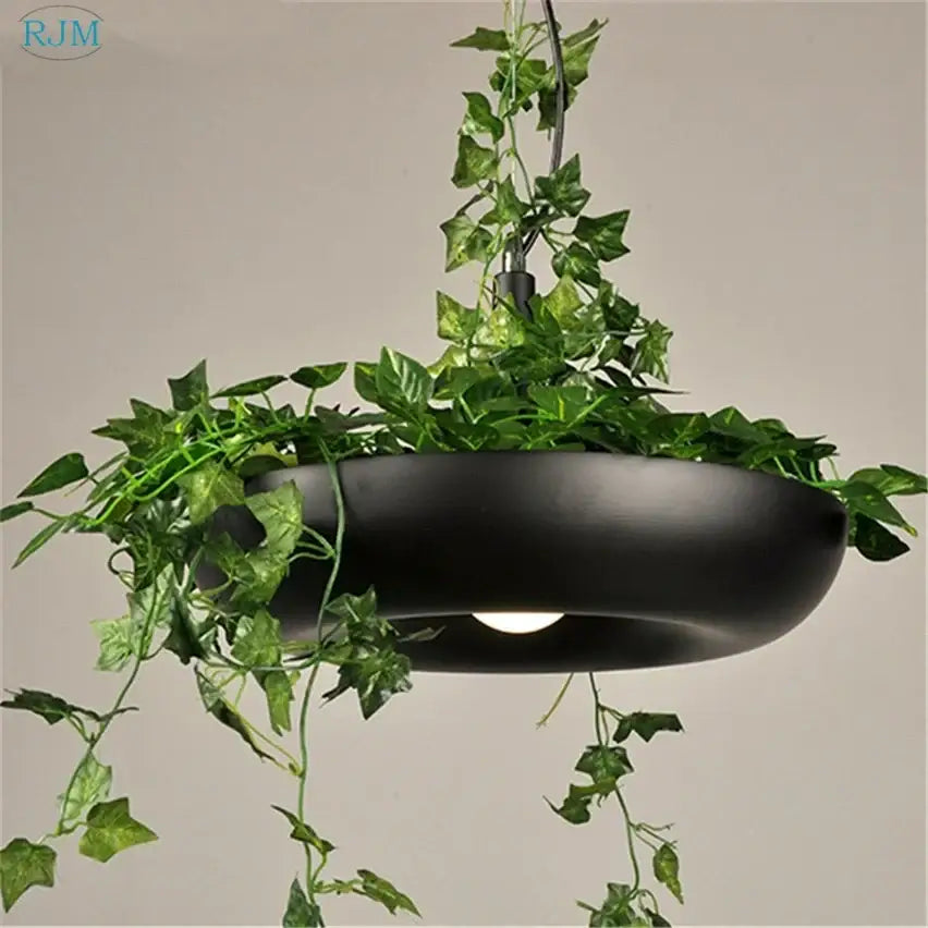 Black matte babylon garden pot pendant light with cascading green ivy garden pot plants for kitchen decor