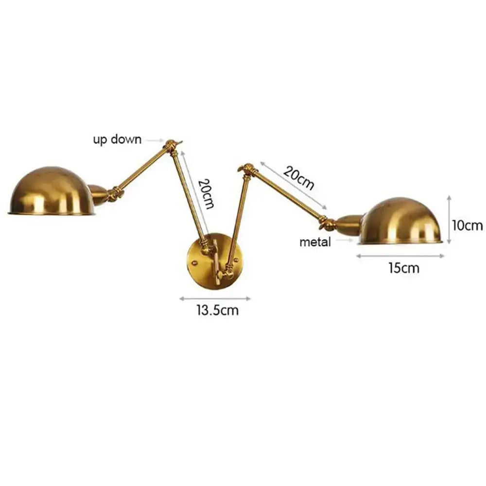 Brass-finished double swing arm wall sconce with adjustable dome shades for bedroom reading light use