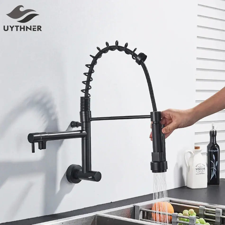 Black matte dual spout kitchen faucet with flexible coiled hose and pull-down spray head by decorbites dual spout