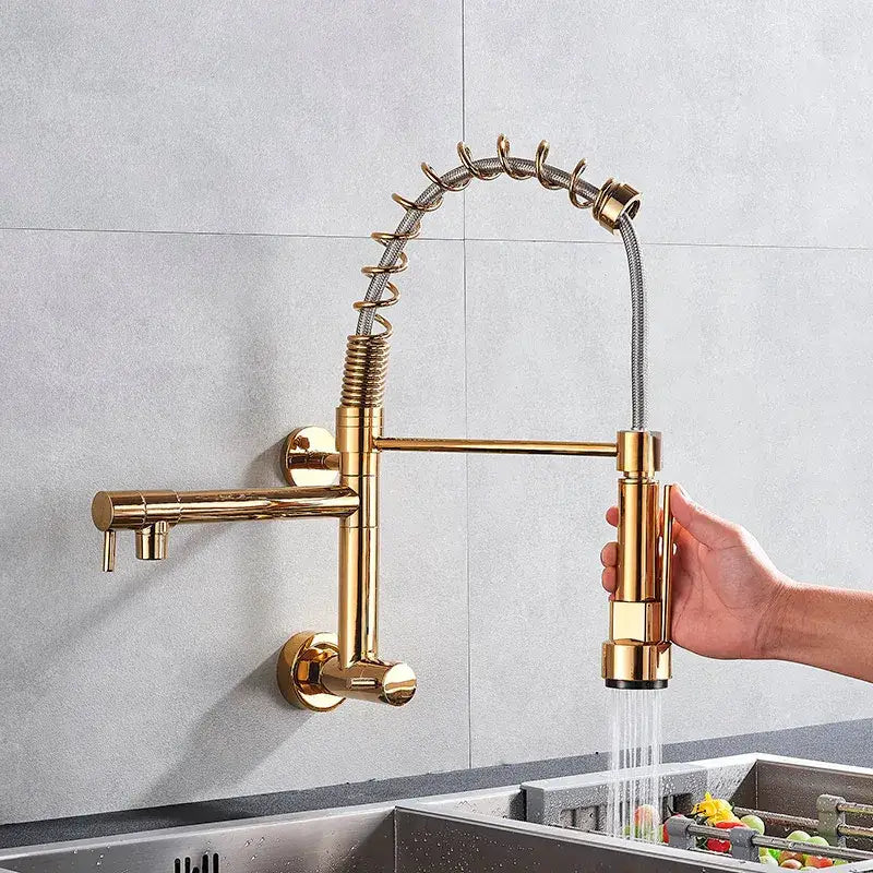 Gold-colored flexible gooseneck spout kitchen faucet with pull-down spray head and brushed metal finish for decorbites dual spout use