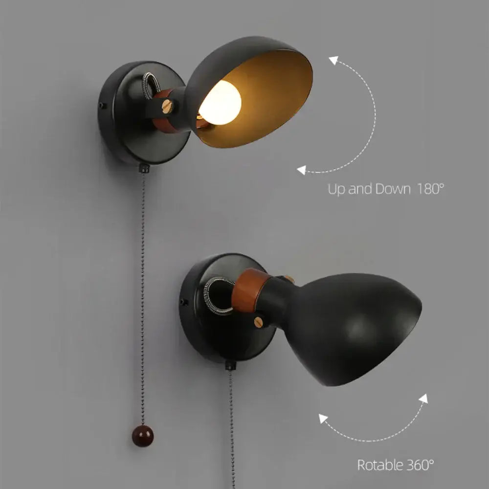 Black matte led wall sconce with warm brass interior wood pull chain and adjustable 180 degree and 360 degree heads decorbites led wall