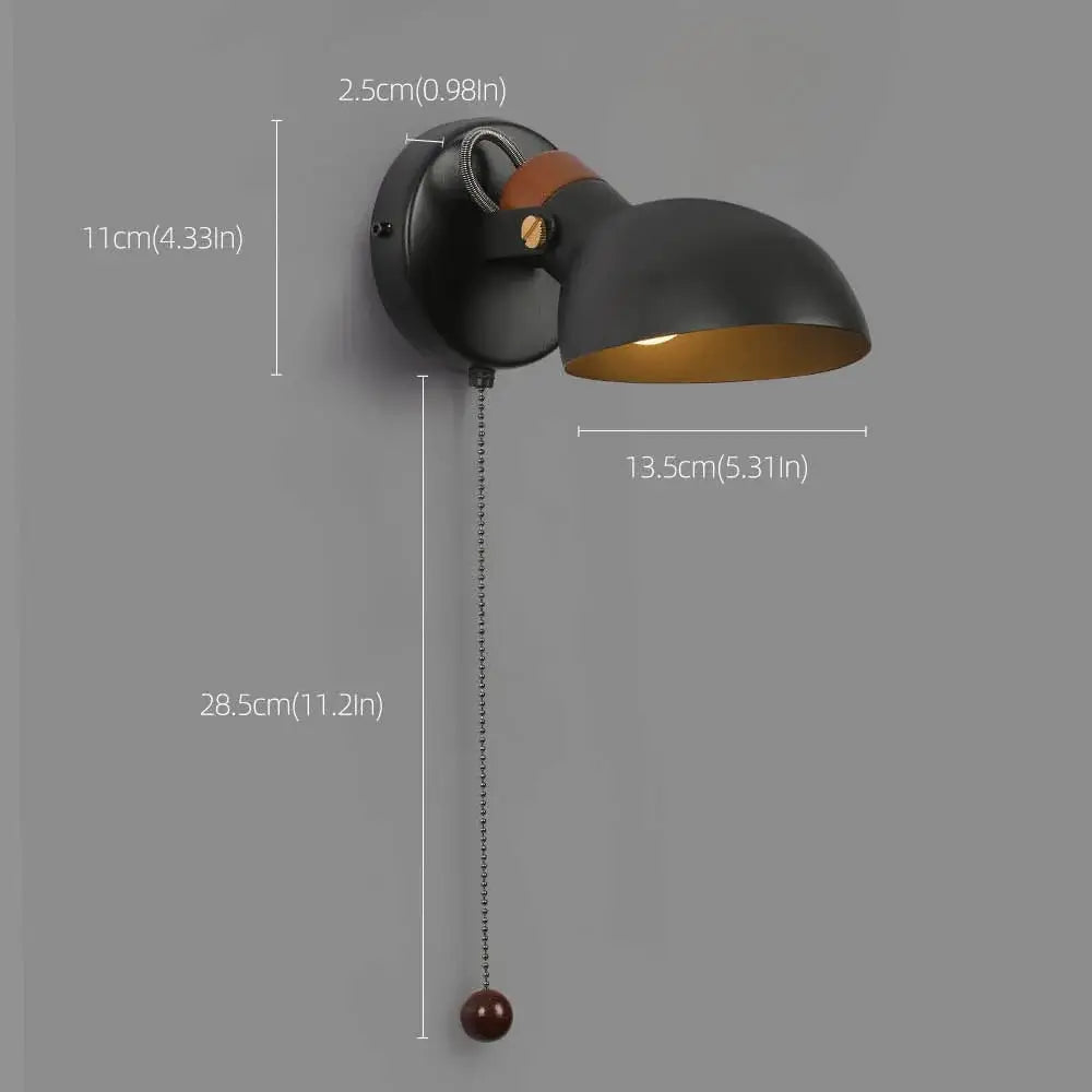 Black matte led wall sconce with gold interior wood pull chain and spherical end cap for bedroom decorbites led wall lighting