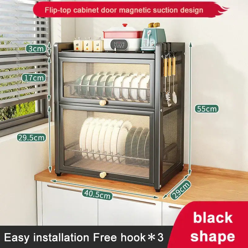 Black metal double layer dish drying rack with flip-top cabinet door, magnetic suction, and mesh sides for kitchen storage