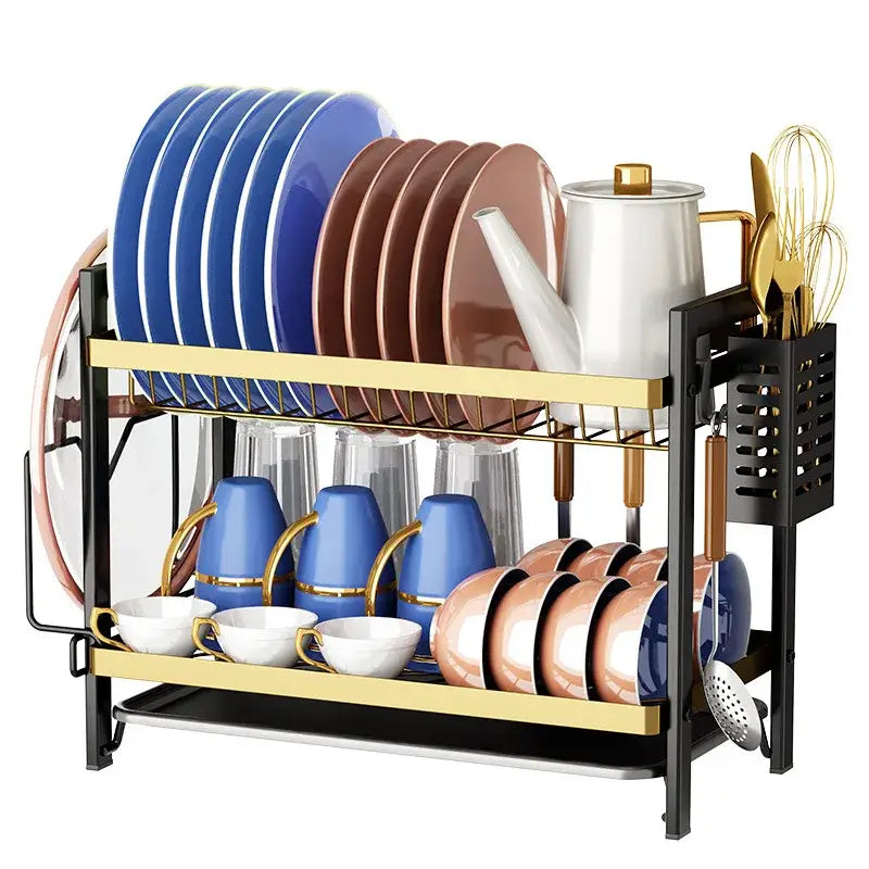 Modern black and gold metal 2 tier kitchen dish rack holding colorful plates cups bowls and utensils with utensil holder