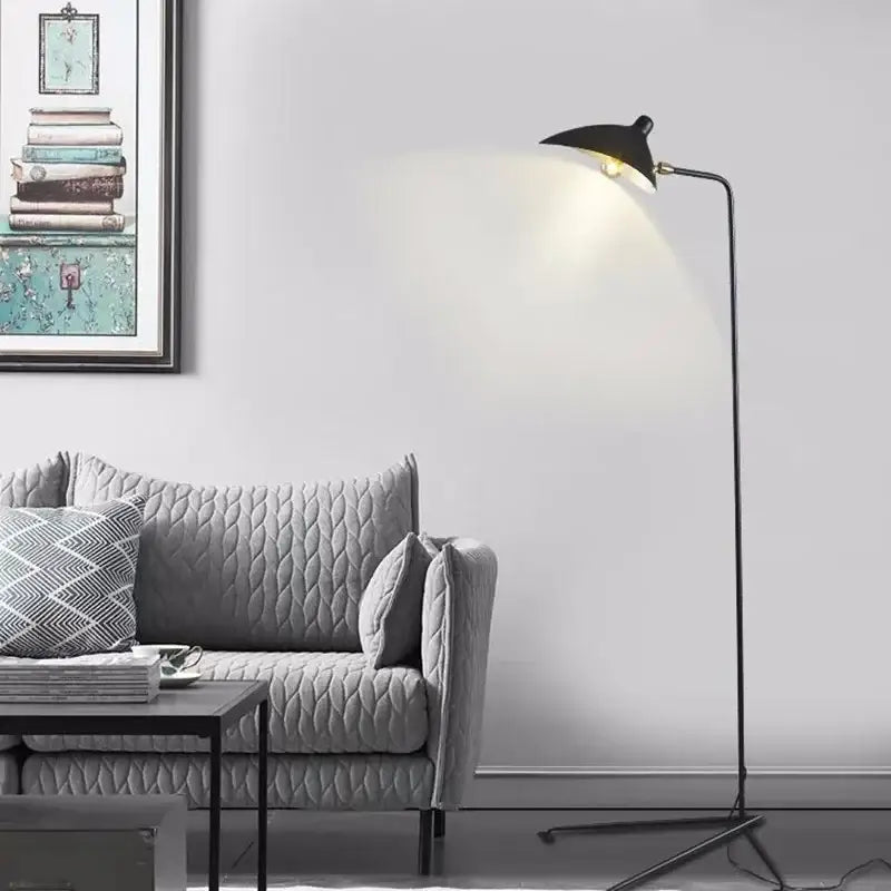Black metal 3-arm floor lamp with adjustable arm and sleek curved neck casting warm light for living room decorbites adjustable arm