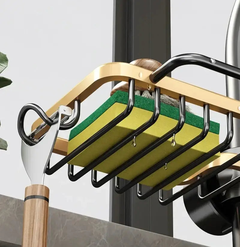 Gold-toned metal sink rack with black accents holding green and yellow sponges decorbites adjustable kitchen sink