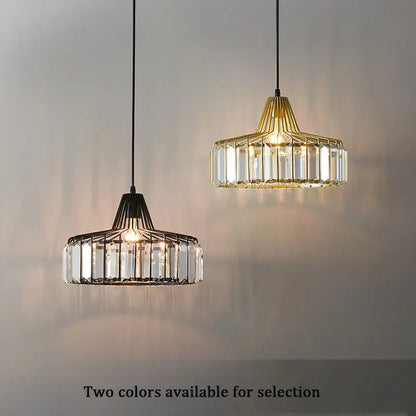 Two modern black metal crystal kitchen pendant lamps with geometric wire frames and clear prisms by decorbites