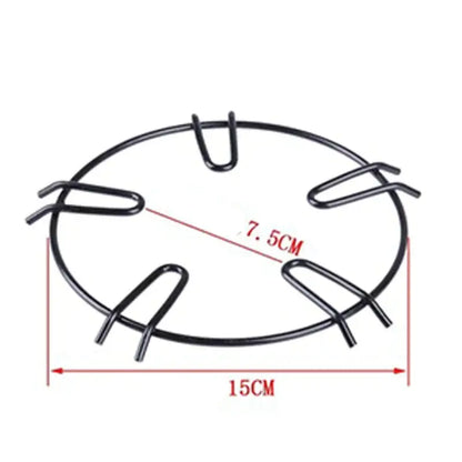 Black metal gas stove pot holder with six u-shaped clips made of metal for holding plates or bowls by decorbites gas stove