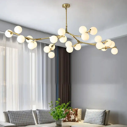 Gold-toned branch-style black metal glass ball led chandelier with frosted globe bulbs for living room decorbites glass ball