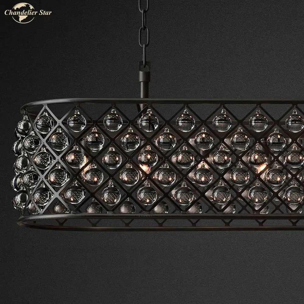 Black metal glass drop chandelier pendant lights featuring geometric lattice and clear glass orbs for dining room