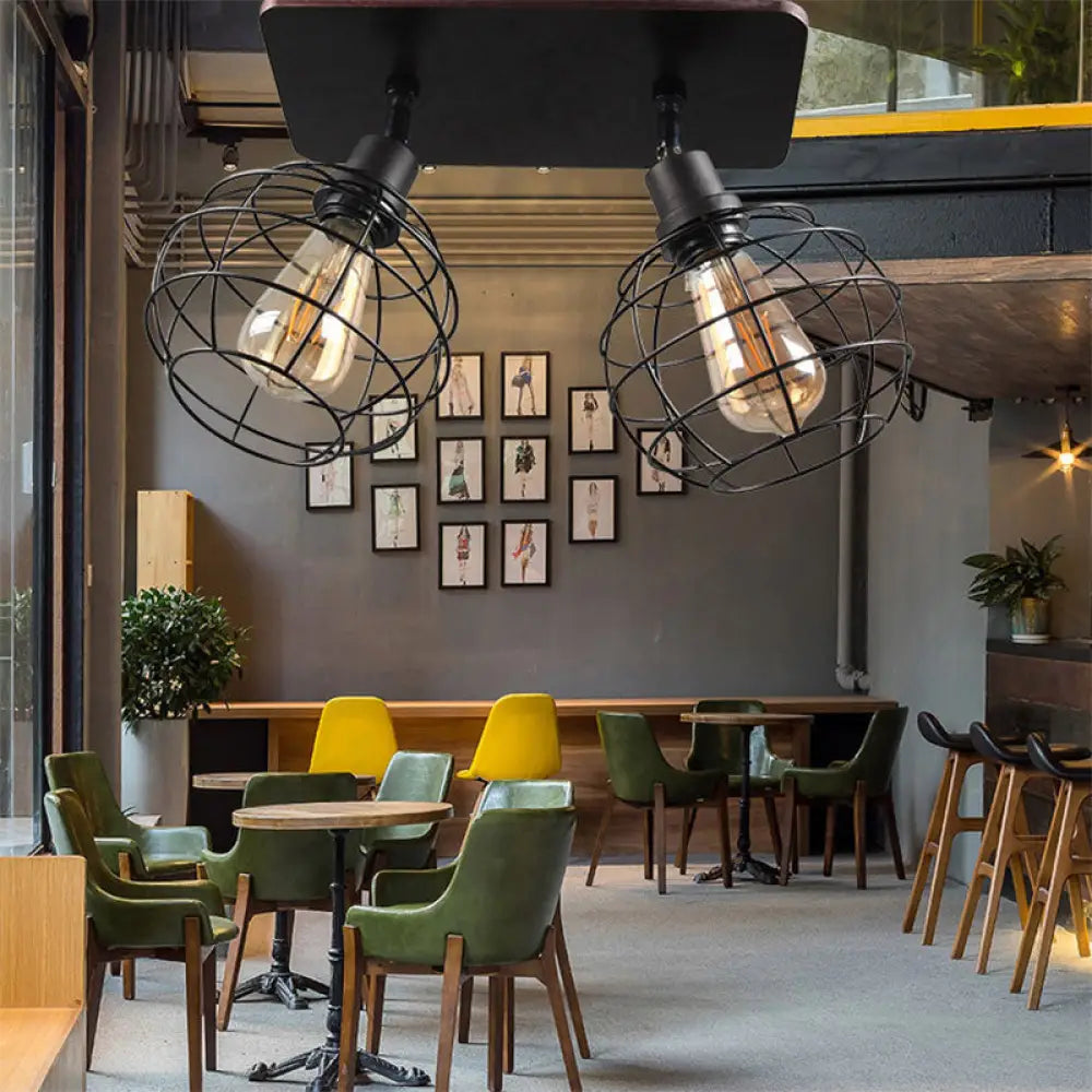 وحدة إضاءة سقف دوارة معدنية سوداء من DecorBites™ للمطاعم - تصميم قفص شبه مسطح صناعي مع رؤوس 1/2/3