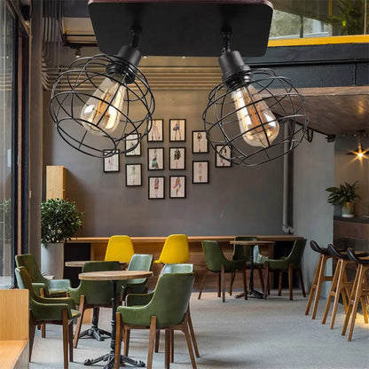 وحدة إضاءة سقف دوارة معدنية سوداء من DecorBites™ للمطاعم - تصميم قفص شبه مسطح صناعي مع رؤوس 1/2/3