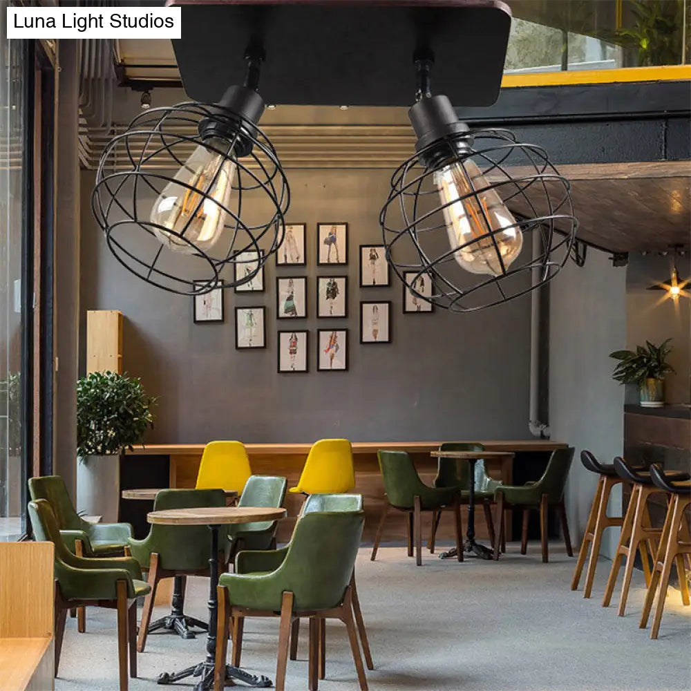 وحدة إضاءة سقف دوارة معدنية سوداء من DecorBites™ للمطاعم - تصميم قفص شبه مسطح صناعي مع رؤوس 1/2/3