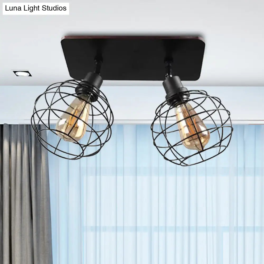 وحدة إضاءة سقف دوارة معدنية سوداء من DecorBites™ للمطاعم - تصميم قفص شبه مسطح صناعي مع رؤوس 1/2/3