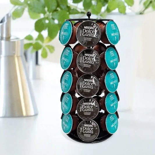 Black metal rotating dolce gusto storage rack displaying teal and brown nescafé dolce gusto espresso intenso capsules
