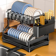 Black metal tiered kitchen dish drainer and storage rack holding plates glassware and utensils from decorbites kitchen dish