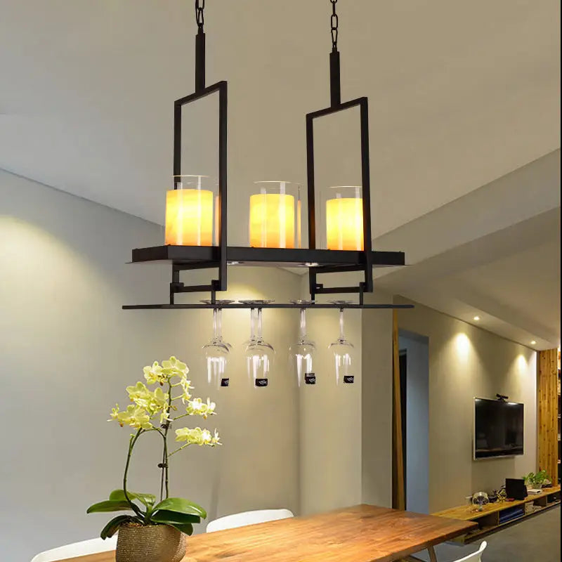 Black metal wine glass chandelier with three amber led candle lights and adjustable chain cord length for dining room use