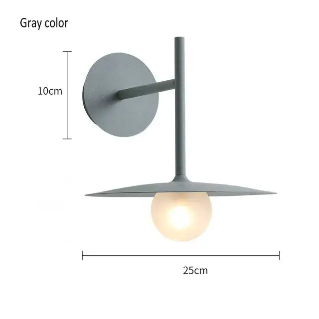 Black minimalist glass ball wall lamp with gray metal sconce and illuminated globe bulb for modern bedroom decorbites wall lamp