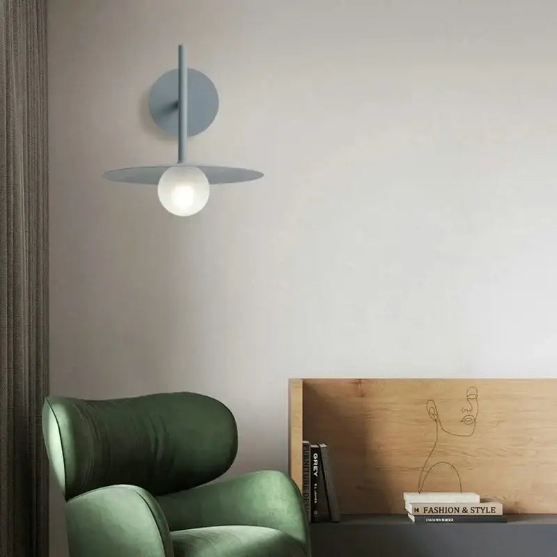 Black minimalist wall lamp with gray circular base glass ball wall sconce featuring frosted glass globe bulb decorbites glass ball