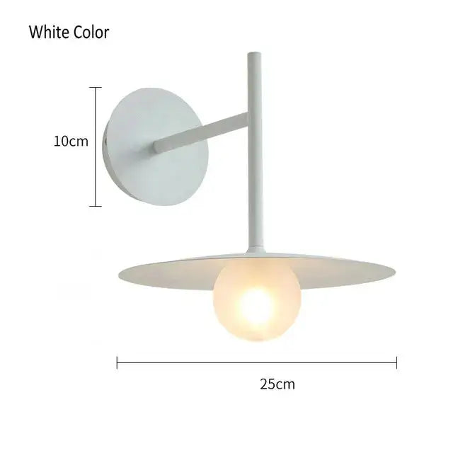 White minimalist wall lamp with a glass ball wall globe bulb and sleek modern design for bedroom decorbites glass ball