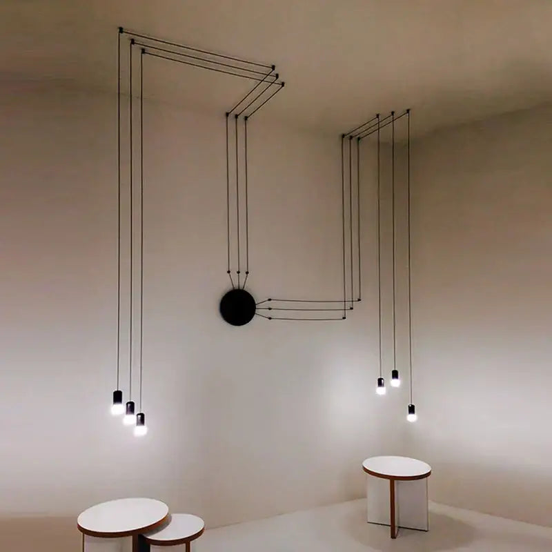 Black minimalist led wall lamp with geometric wireframe and multiple hanging bulbs for bedroom and living room decorbites black minimalist
