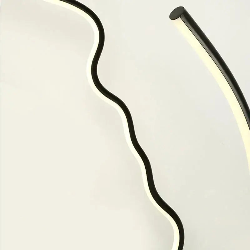 Black nordic human face floor lamp with black and white wavy led light fixture for modern living room decorbites black nordic