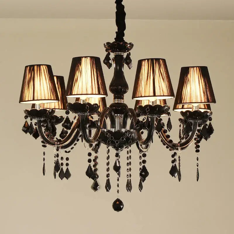 Elegant black ornate crystal pendant chandelier with warm-toned lampshades for living room decorbites crystal pendant
