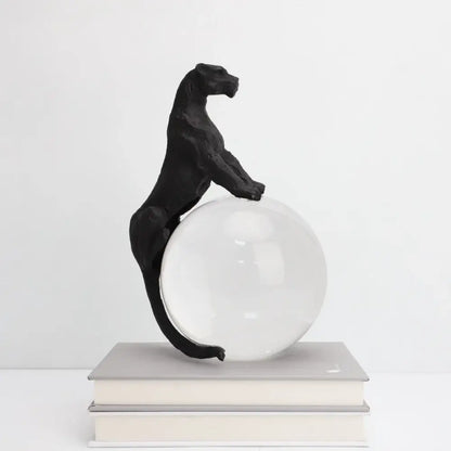 Black panther crystal ball metal animal sculpture standing atop a clear glass sphere for decorbites crystal ball decor