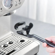 Black plastic coffee machine grinder brush with dual coiled bristle heads for decorbites coffee machine cleaning