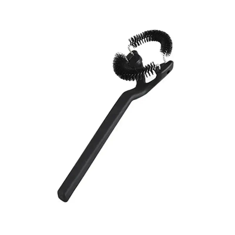 Black plastic coffee machine grinder brush with three curved bristled heads for cleaning tight spaces in coffee machines