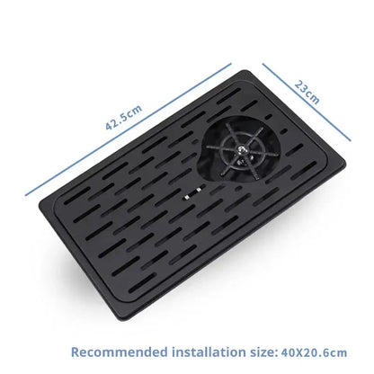 Black rectangular plastic glass rinser faucet tray with central circular filter and slotted drainage channels for kitchen use