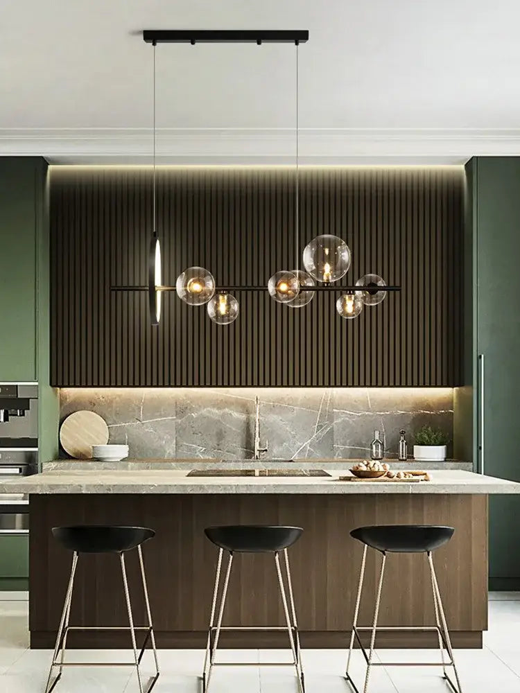 Modern glass globe pendant light with sleek black metal frame and warm bulbs in decorbites black postmodern bubble design