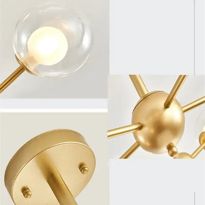 Gold-toned decorbites black postmodern sputnik chandelier with clear glass globe shades and central spherical hub for dining room