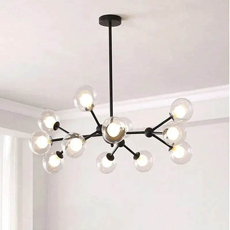 Black postmodern sputnik chandelier with black metal frame and clear glass globe bulbs for dining room decorbites black postmodern